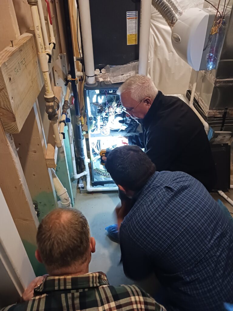 Looking at the inside of a furnace with group of people